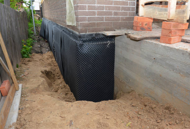 Happy homeowners after waterproofing job in Hermitage